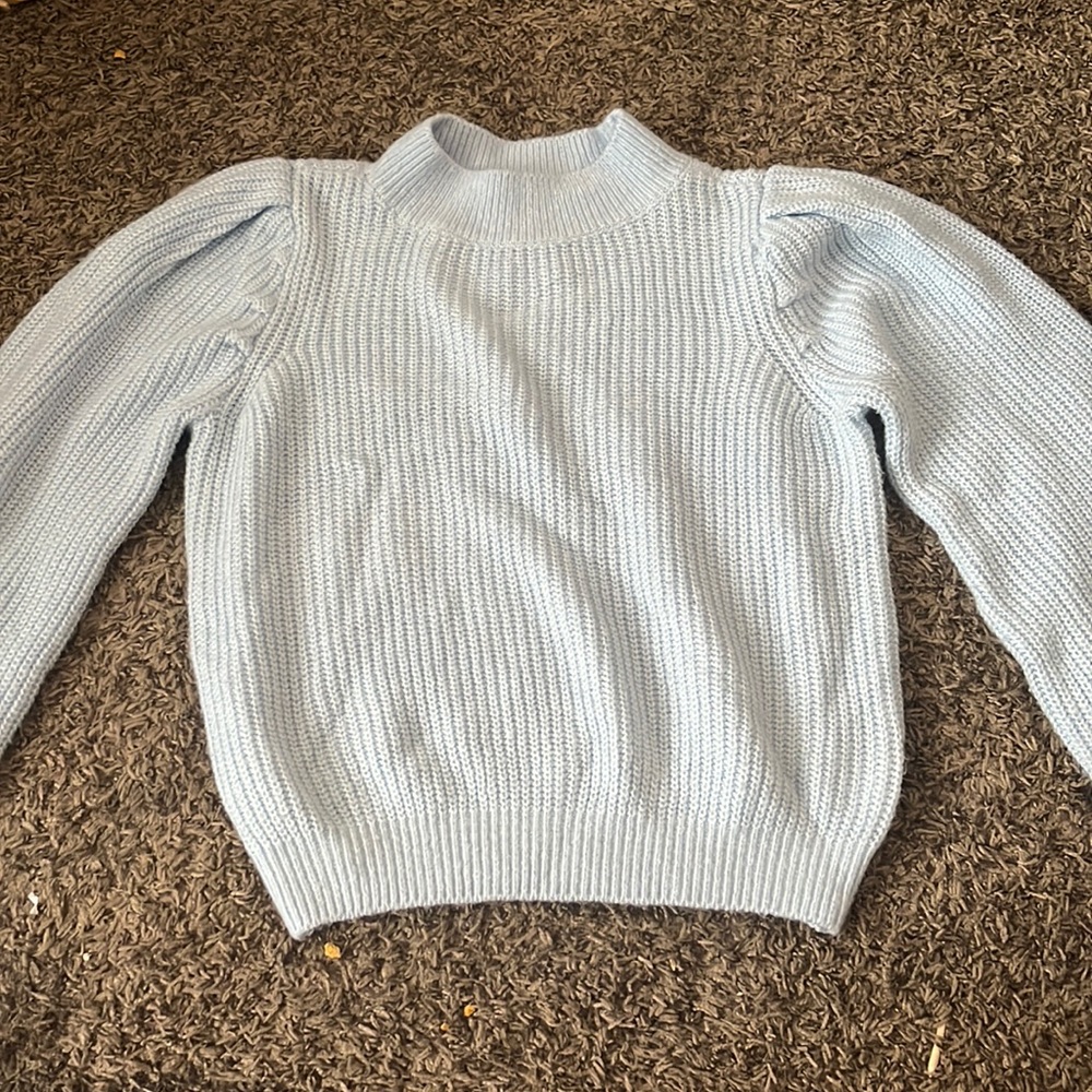 light blue sweater